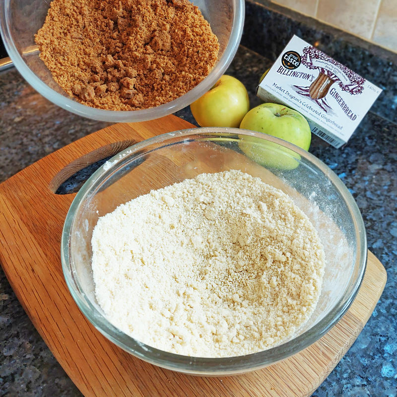 Billington's Gingerbread Apple and Blackberry Crumble: Adding the crushed Billington's Gingerbread to the crumble mix.